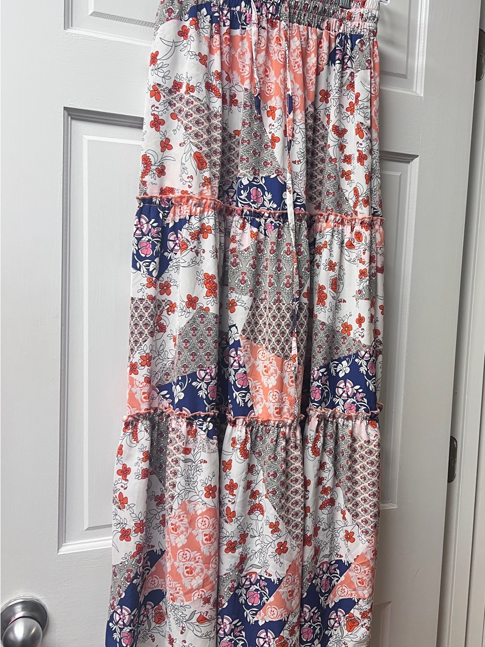 Boho Floral Tiered Maxi Skirt. It has pockets!! Very lightweight material.